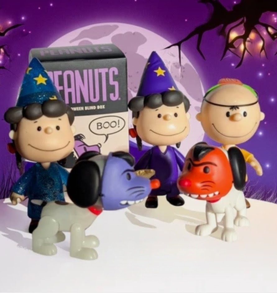 Peanuts Halloween blind box figures group featuring Charlie Brown in blue glitter outfit