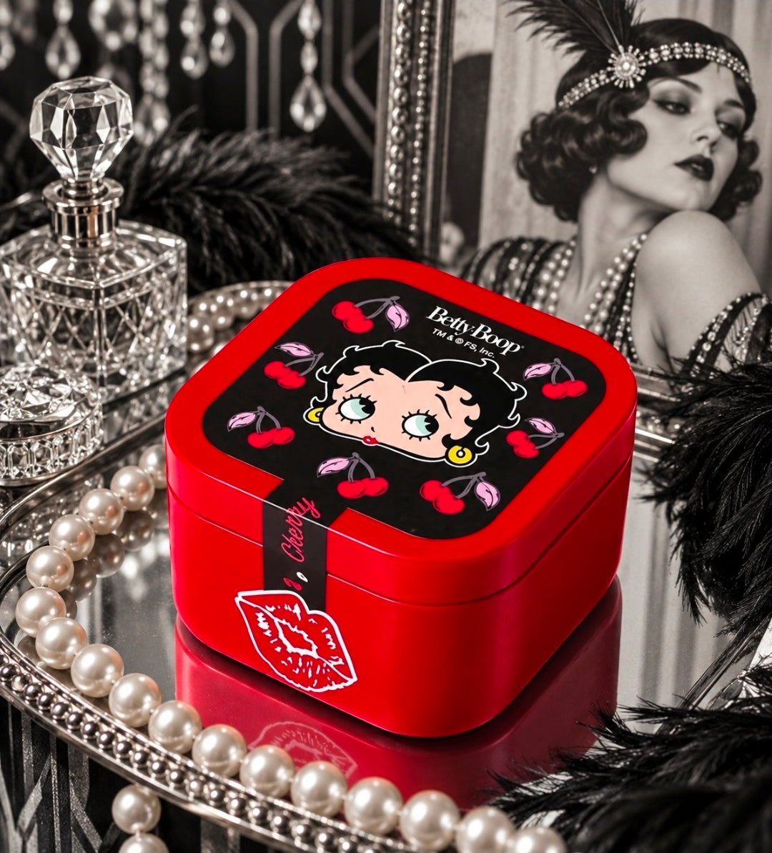 Red square candle tin with black lid panel, Betty Boop cherries and graphic seal