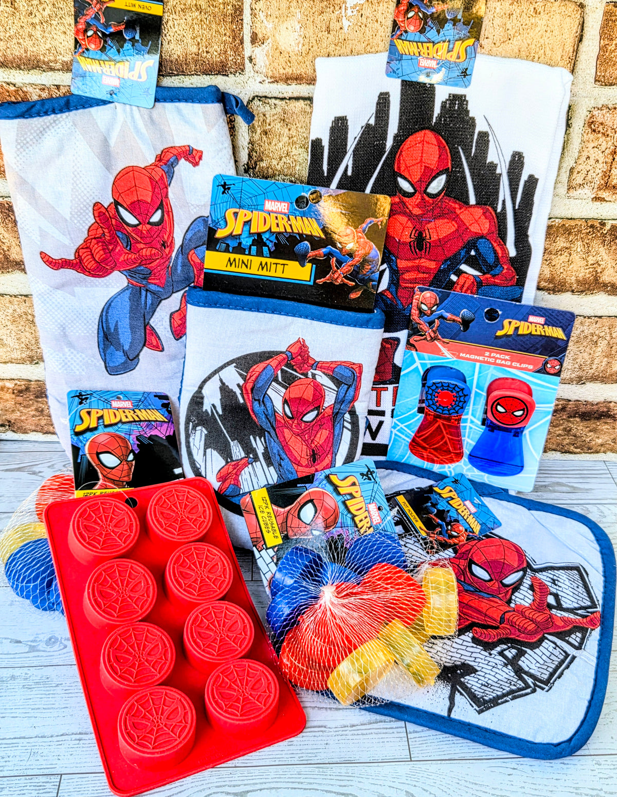 Spider-Man kitchen gift set with silicone ice mold tray, towel, and mini mitt