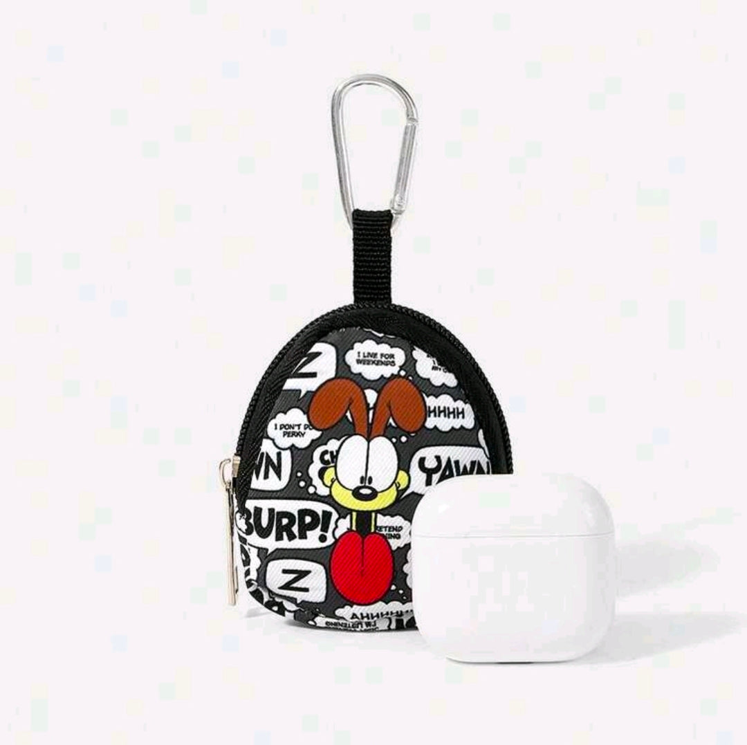 Round black comic pouch with metal carabiner beside white earbuds case