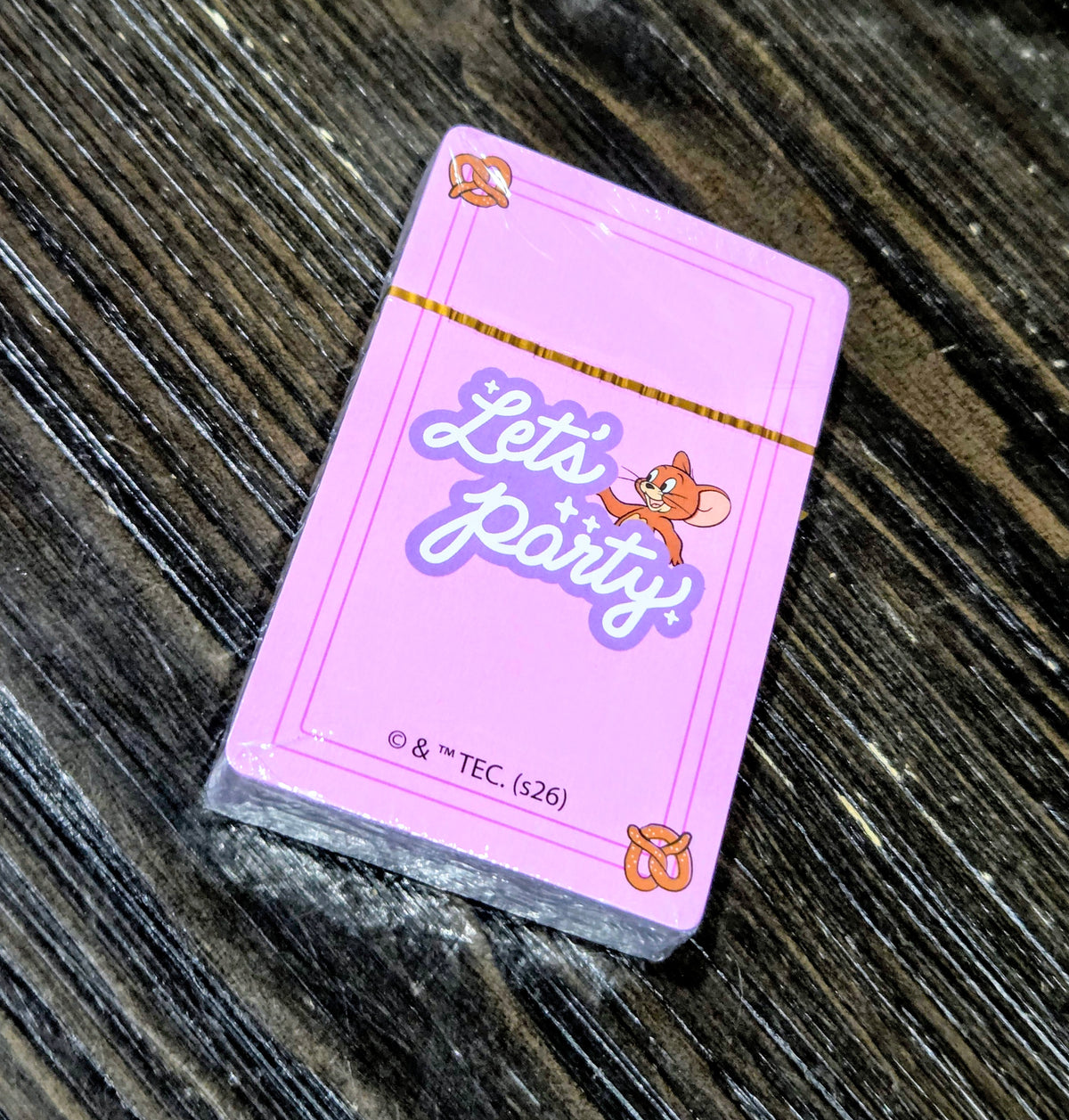 Purple Tom & Jerry “Let’s Party” playing card deck, sealed pack with bow icon corners