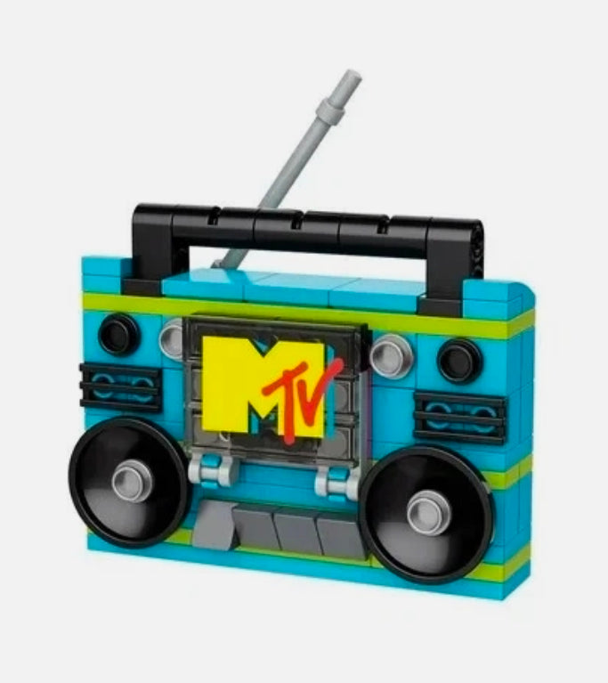 Turquoise MTV boombox brick model with black speaker wheels and gray antenna