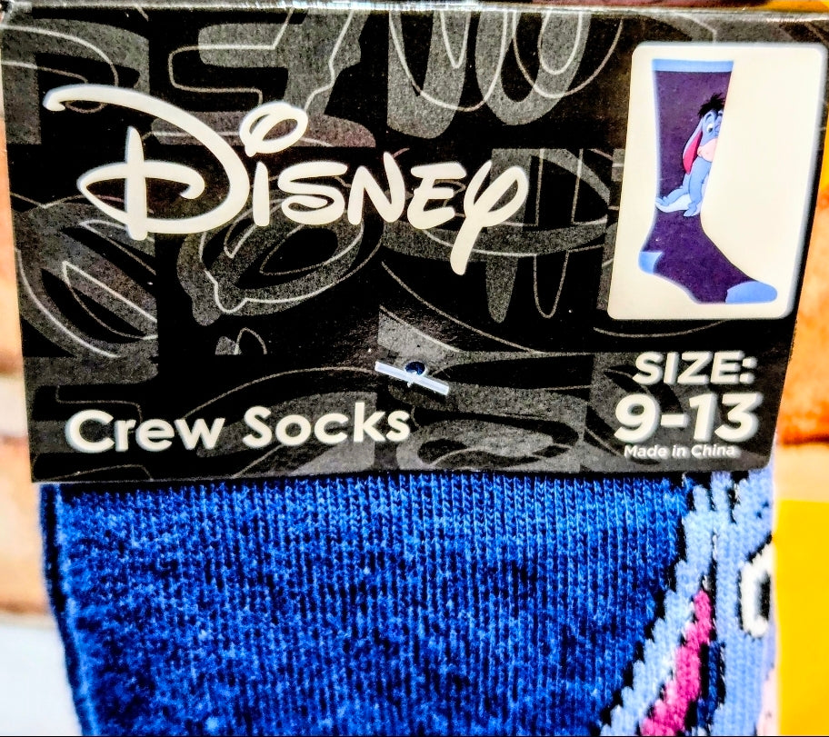 Disney crew socks packaging showing blue knit Eeyore graphic, size 9-13