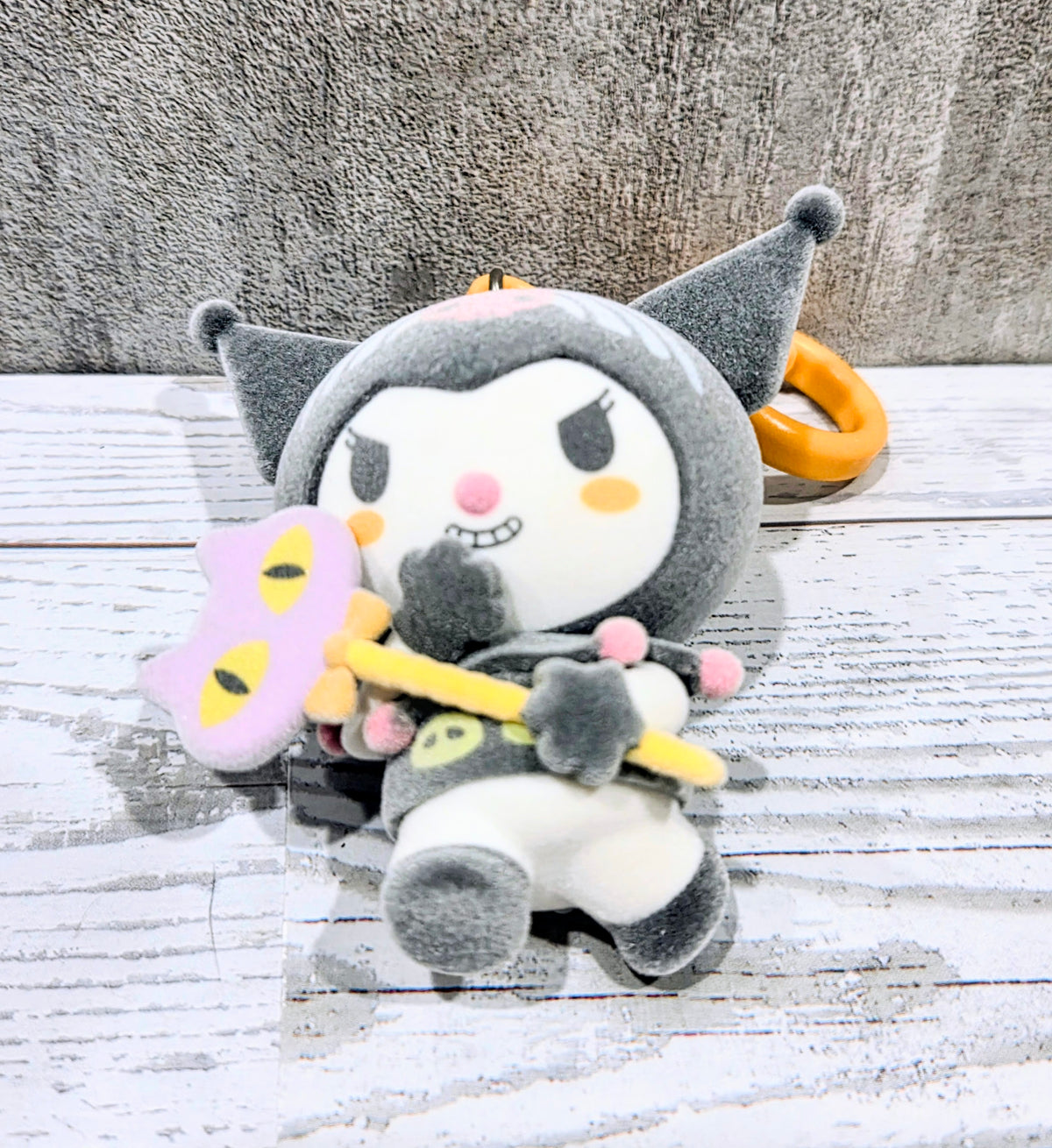 Kuromi Halloween grey plush bag clip with orange loop and pink details