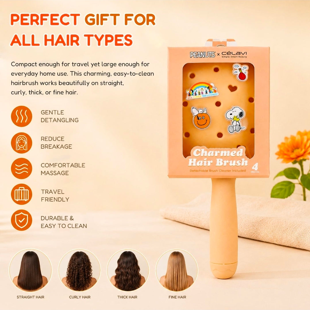 Peach paddle hair brush with Peanuts characters and four acrylic charms, boxed set