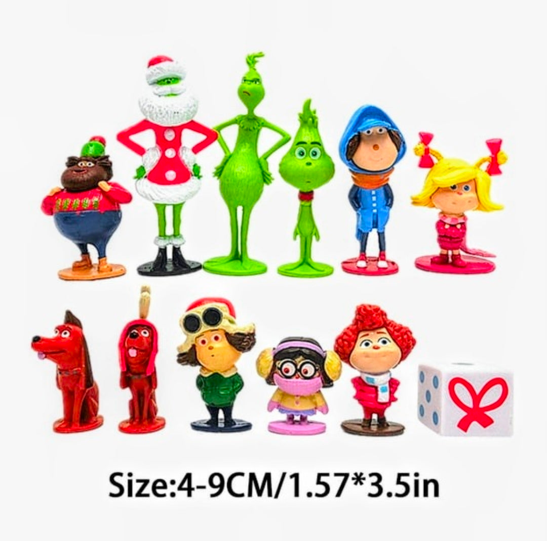 Twelve Grinch-themed character mini figurines standing upright in a group, assorted colors