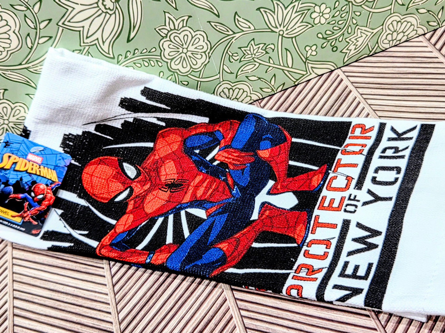 Spider-Man mini mitt towel with red-and-blue character on white fabric