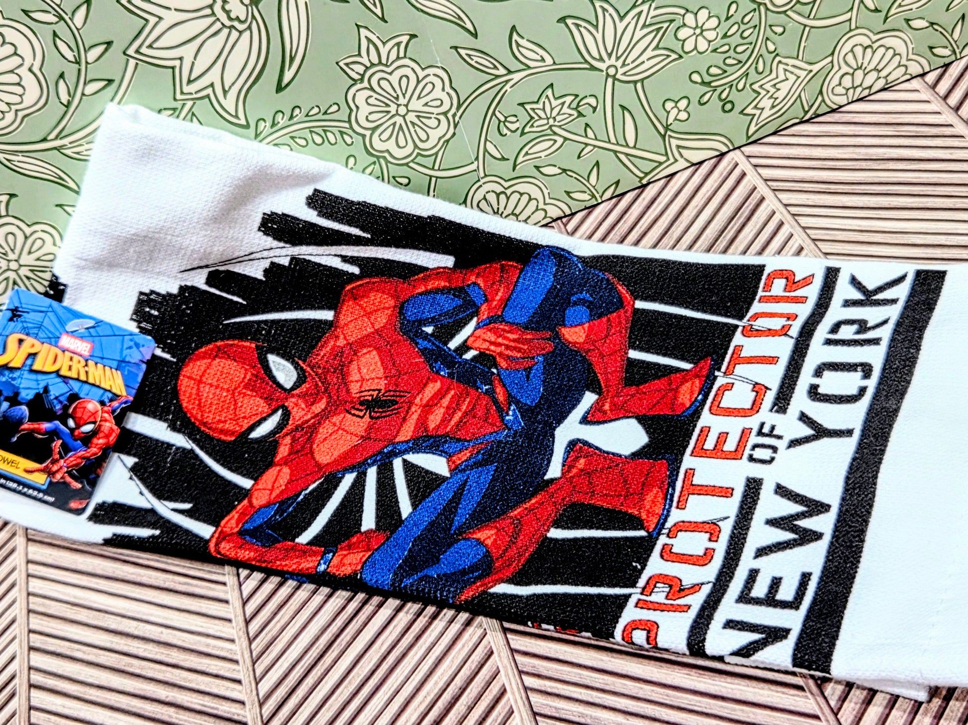 Spider-Man mini mitt towel with red-and-blue character on white fabric