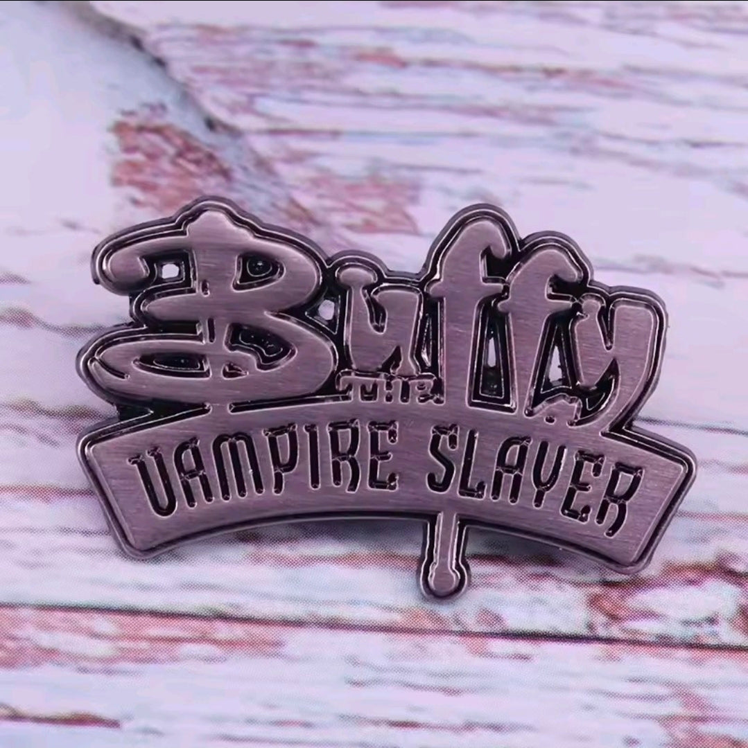 Buffy Vampire Slayer logo enamel lapel pin with shield banner and “Dampire Slayer” text
