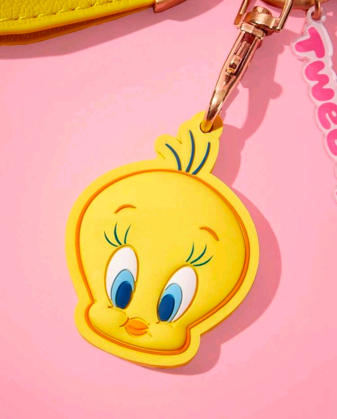 Tweety Bird face charm on a gold keychain clip with yellow strap