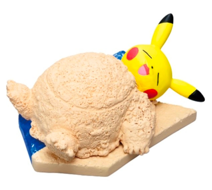 Pikachu seaside mini figure with a large scooped sand form and beige beach base