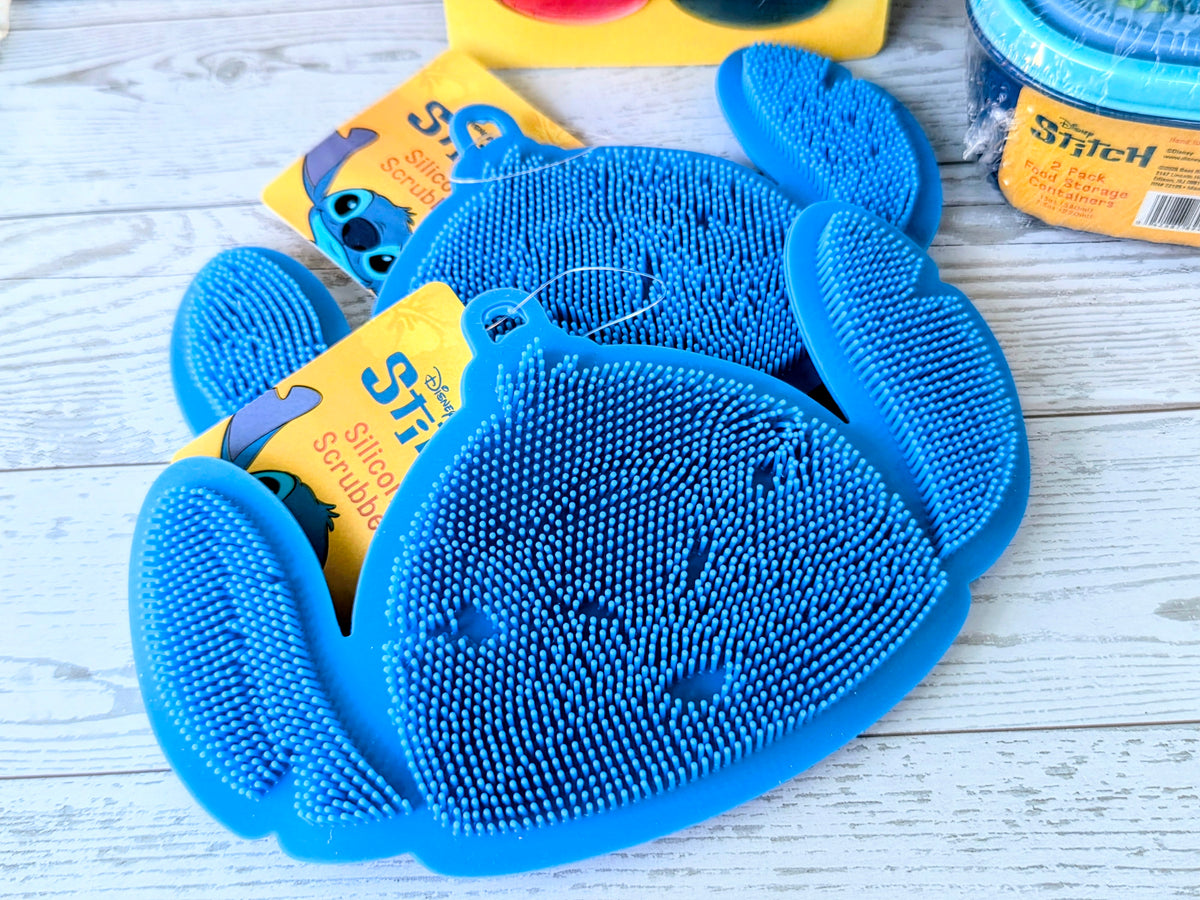 Blue silicone ice cube scrubbers shaped like Stitch with matching package cards