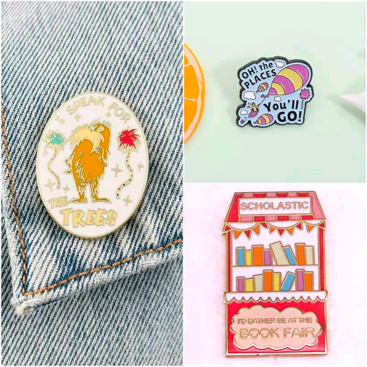 Denim jacket with Speak for the Trees pin; Oh the Places and book fair pins nearby.