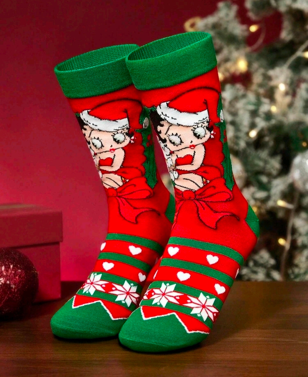 Holiday crew socks, red with green cuffs and bow details, Santa graphic