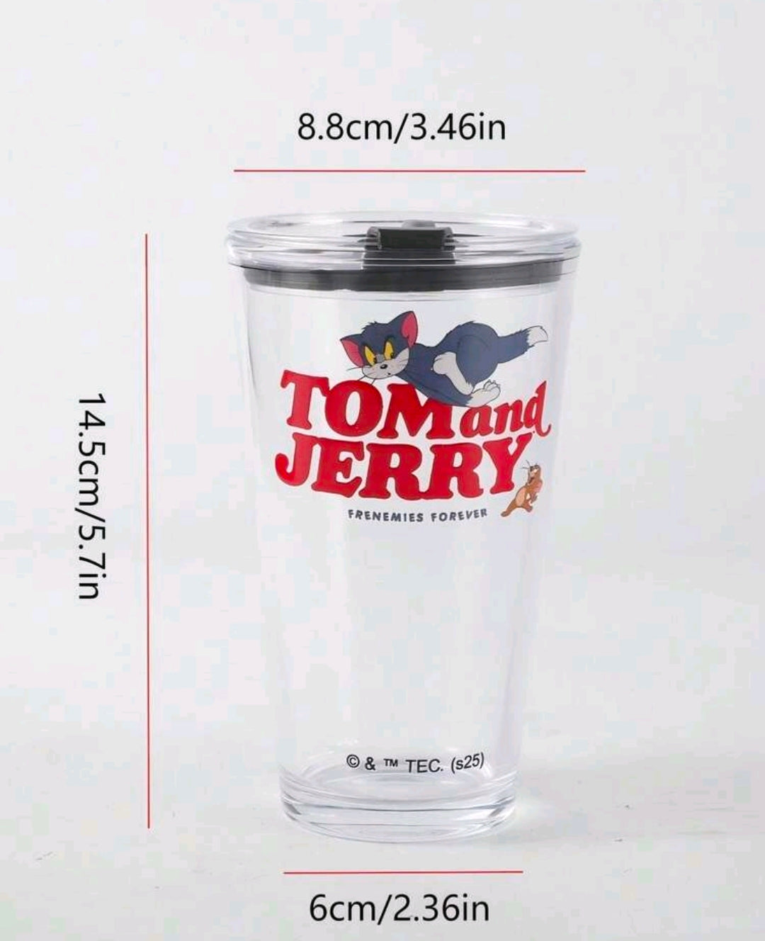 Clear tumbler with Tom and Jerry graphic and size markings, 14.5cm x 6cm