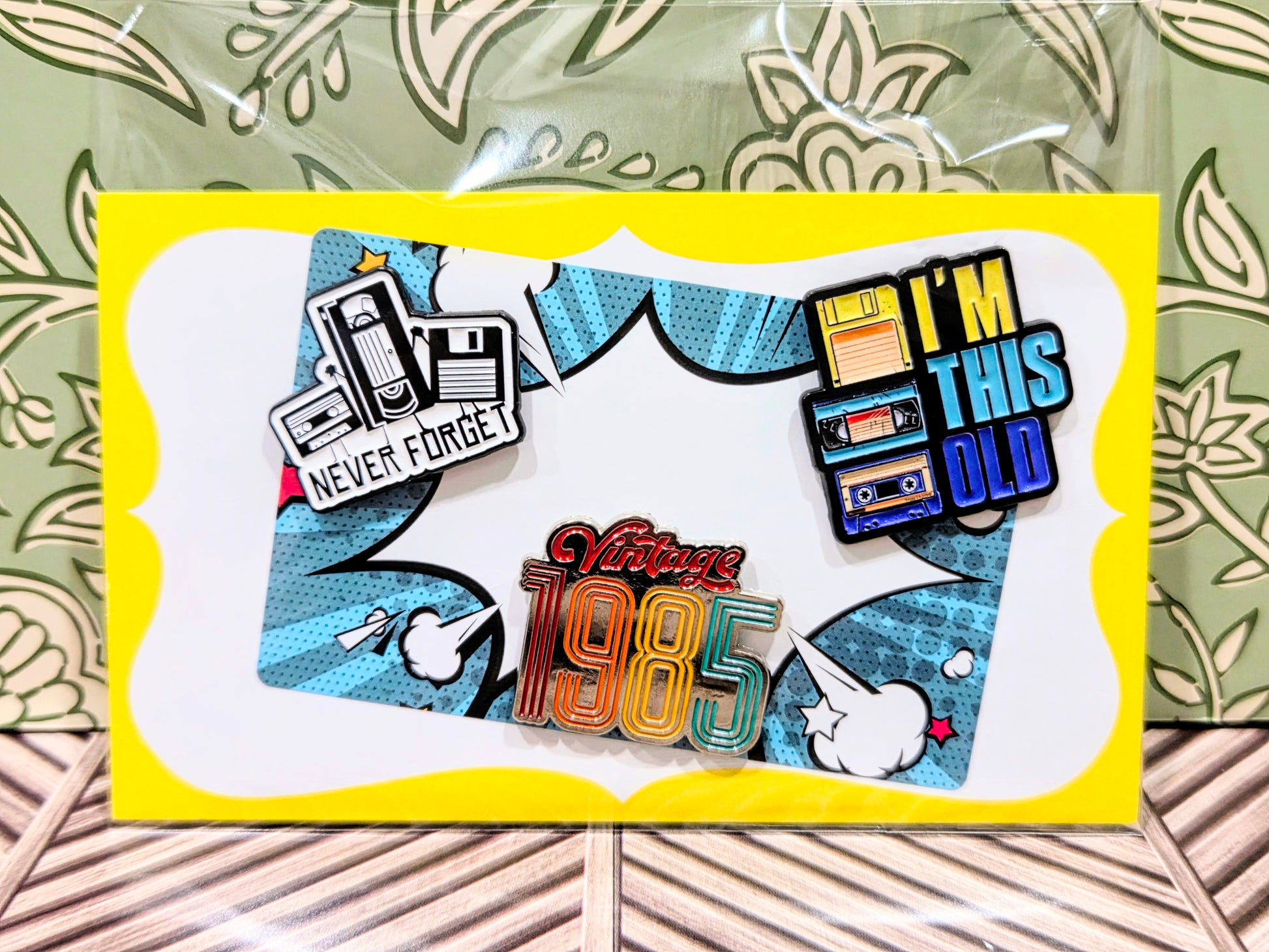 Enamel pins set on display card with 'I'm this old' and 'Vintage 1985' designs