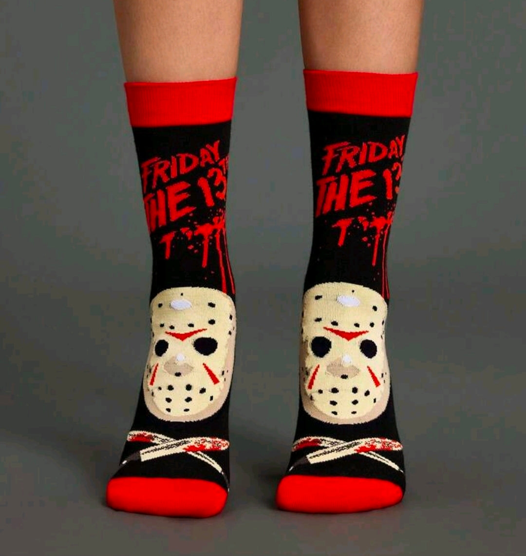 Black crew socks with red cuffs and white hockey-mask graphic on both socks
