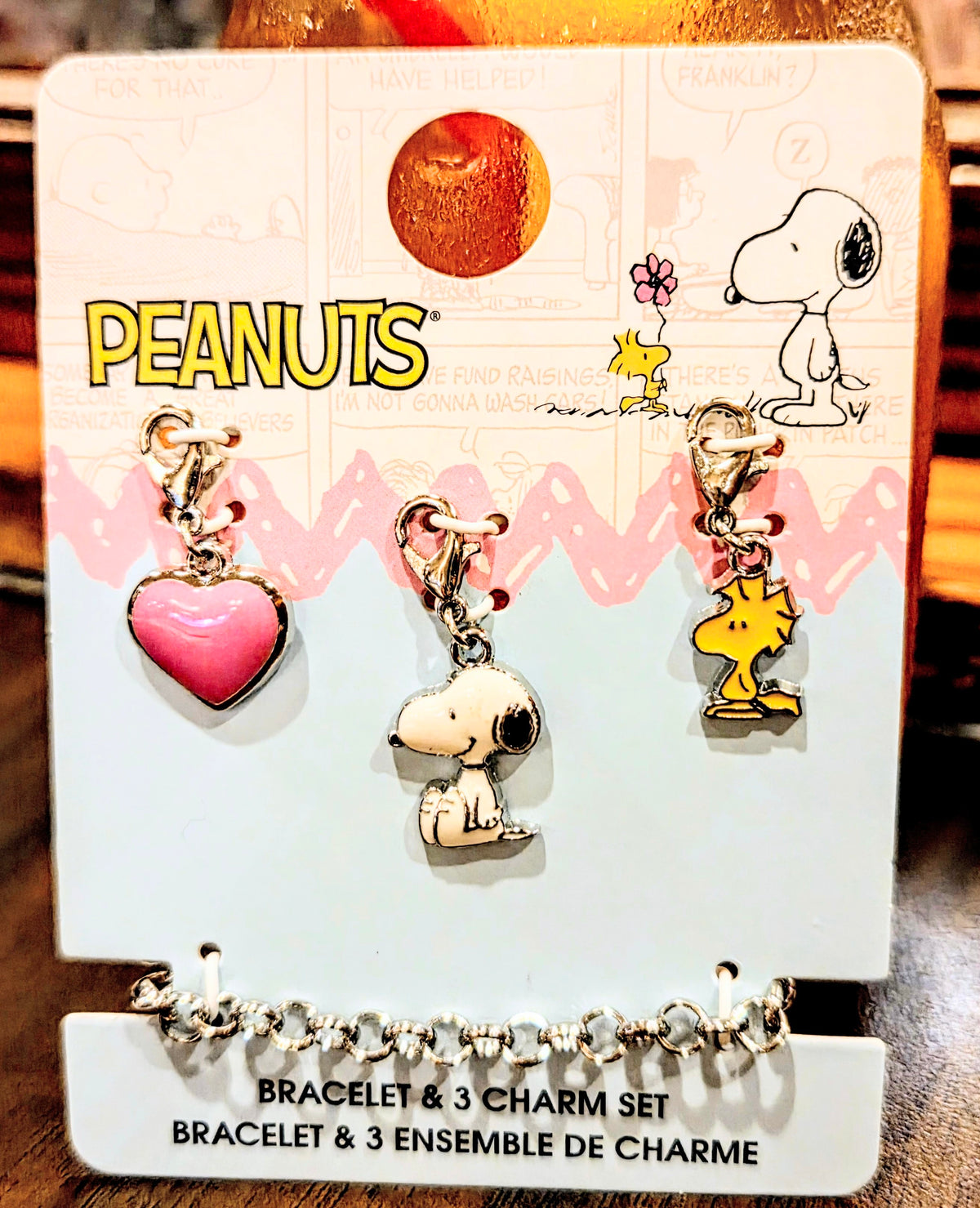 Charm bracelet set with pink heart, Snoopy dog charm, and yellow bird charm