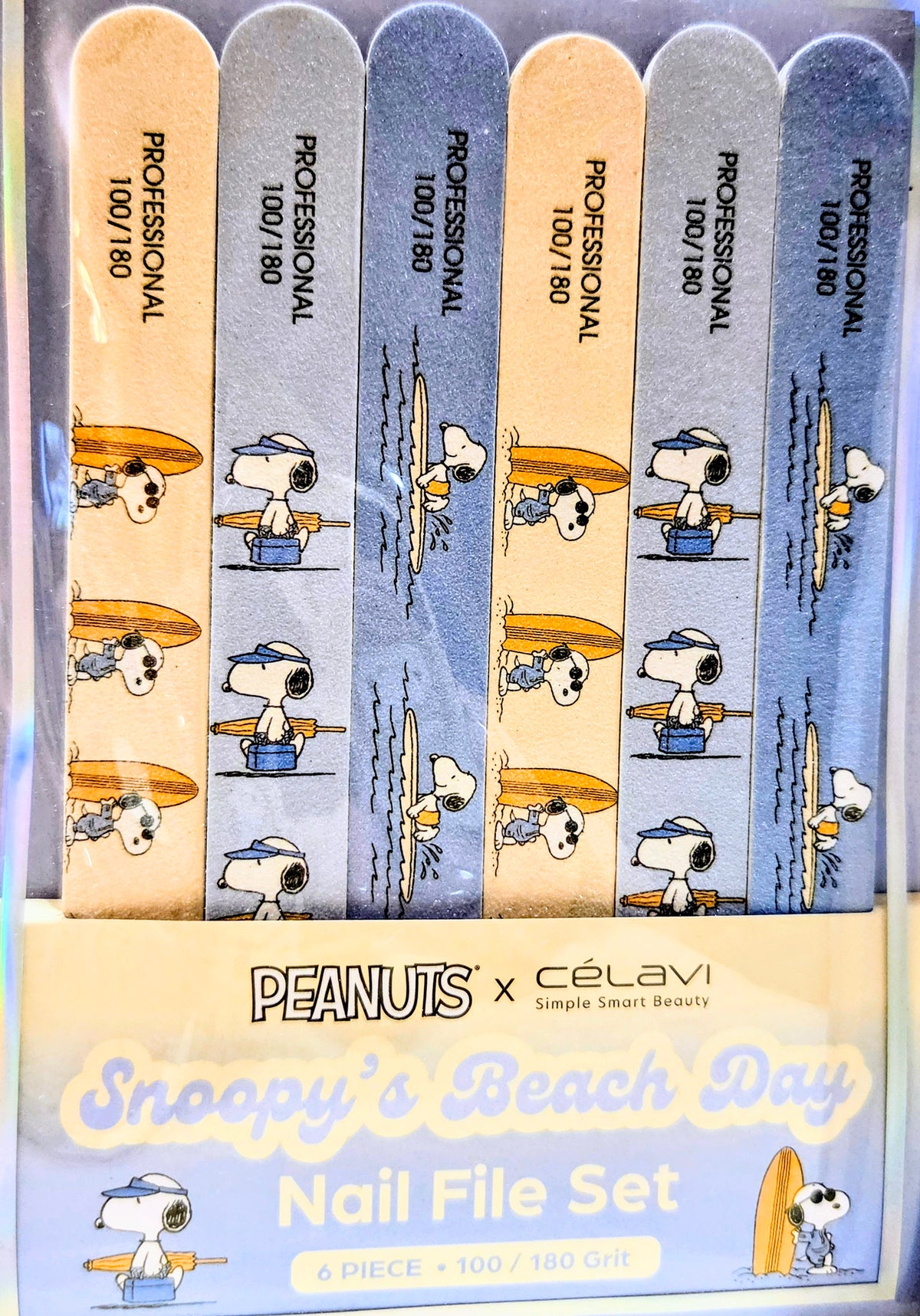 Six nail file strips in a set with Snoopy beach artwork and grit markings