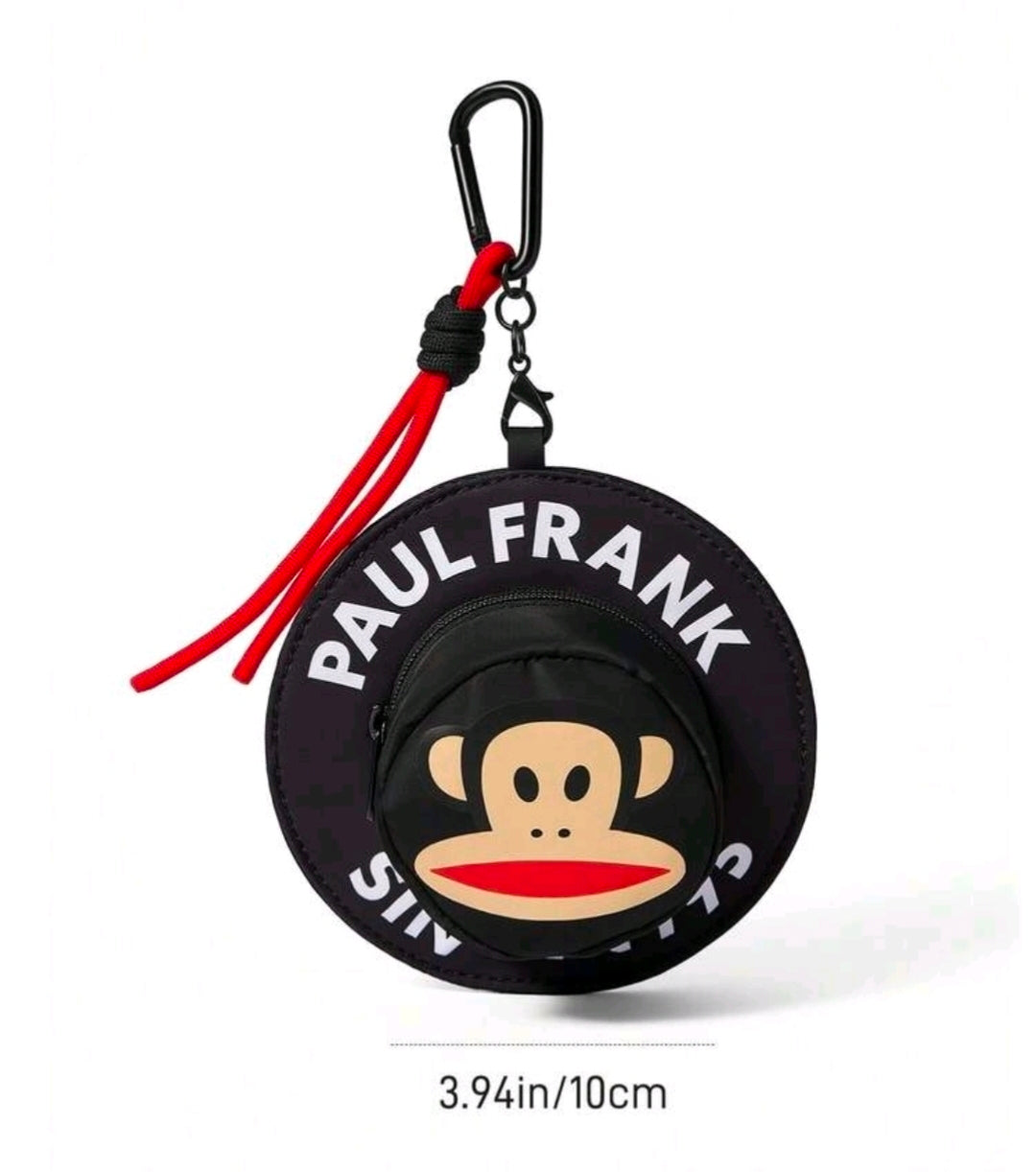 Black monkey-face coin pouch keychain with zipper, red cord tassel, and carabiner