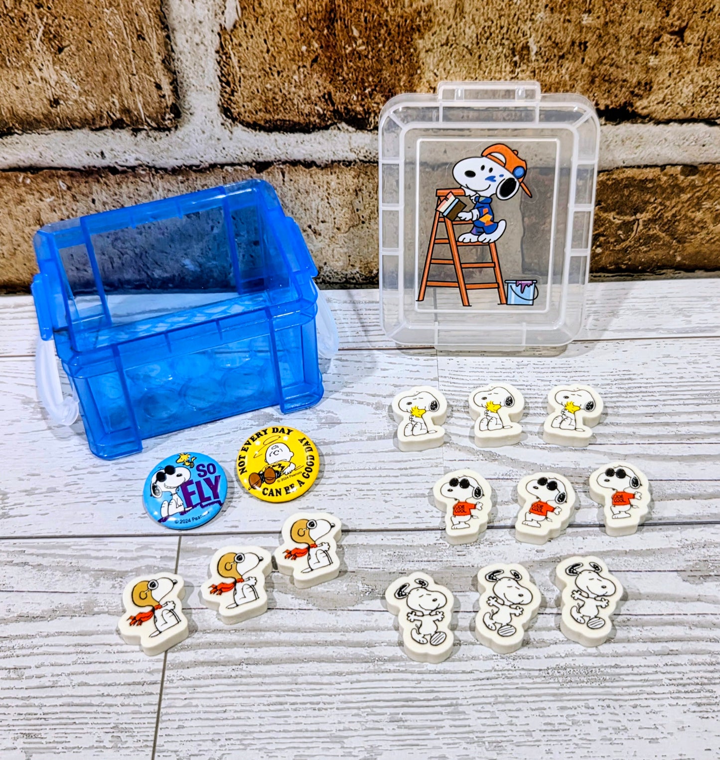 Mini desktop organizer box with blue base and clear lid, Snoopy eraser toppers