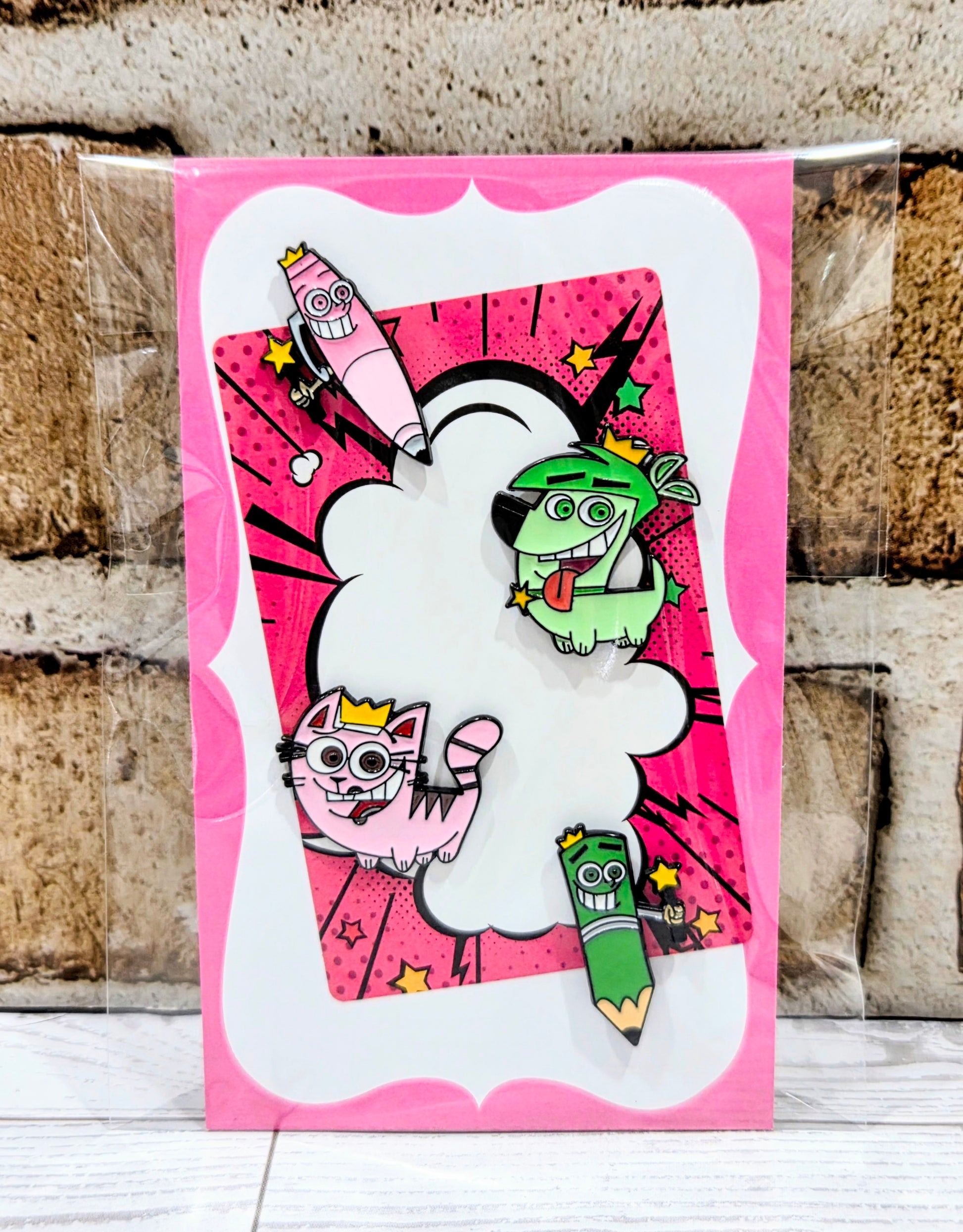 Enamel pin set package card with white border and four character pin designs