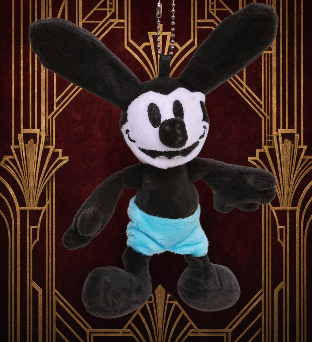 Oswald Lucky Rabbit mini plush keychain rabbit, front view, blue shorts and hanging beaded chain