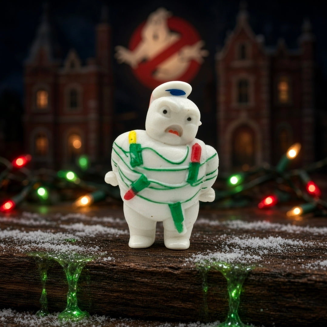 White Mini-Puft ghost figure in green striped suit with yellow and red matchstick details