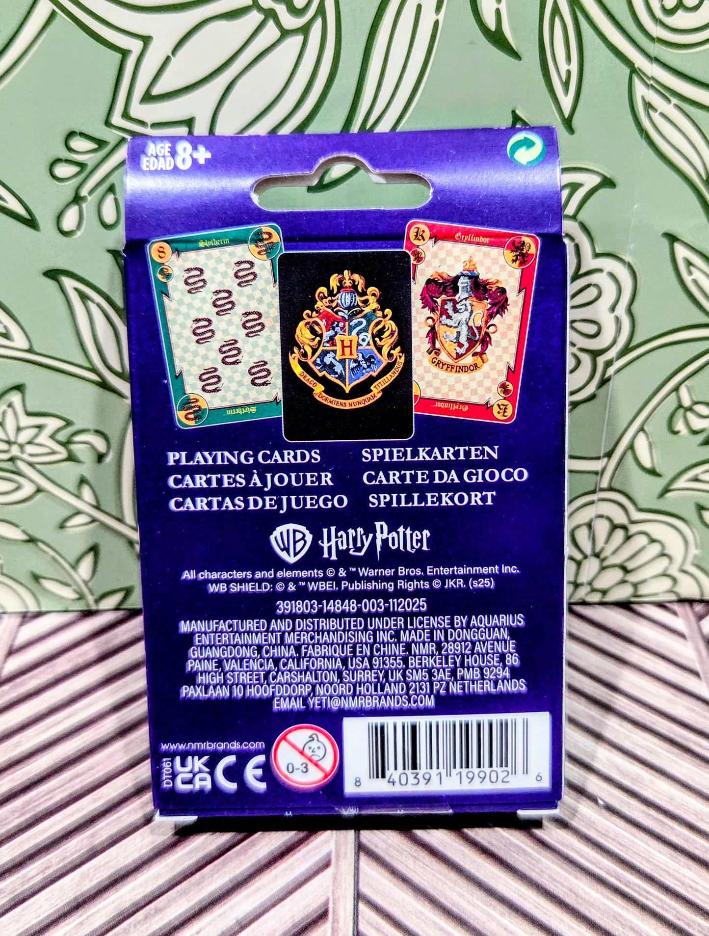 Playing cards deck back package with Hogwarts branding and hanging display slot