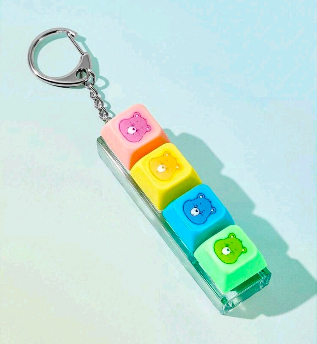 Keychain fidget with clear holder and pink, orange, blue, green blocks with bear faces