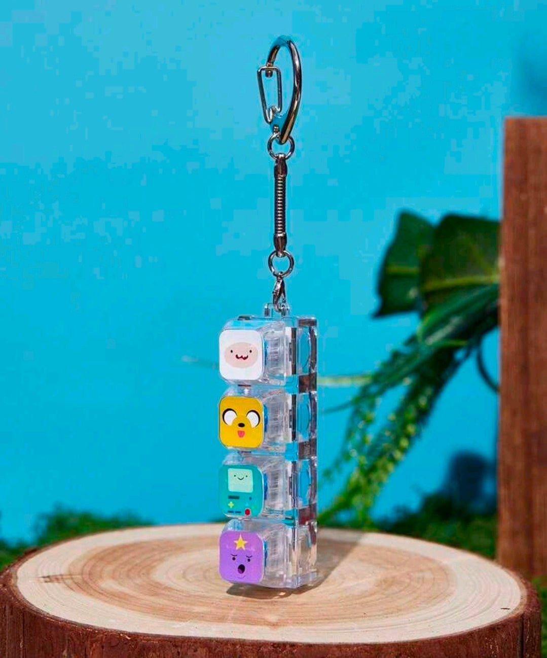 Clear clicker keychain with stacked character charms and metal key ring