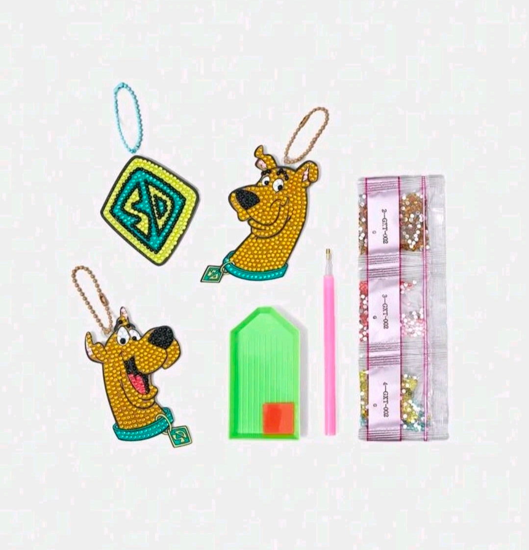 Diamond painting ornament kit: four dog charms, green tray, pink stylus, bead sheets