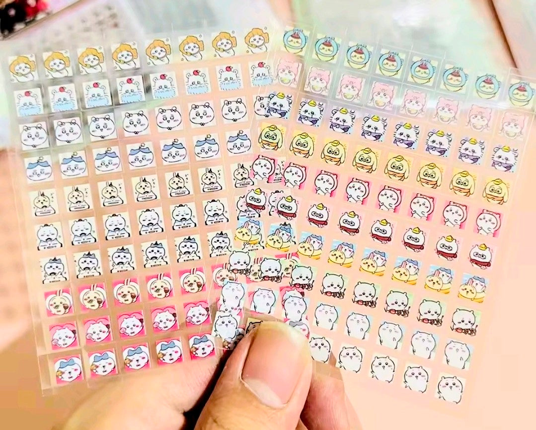 Clear-back sticker sheet with assorted cute character faces in pink, yellow, and green grids