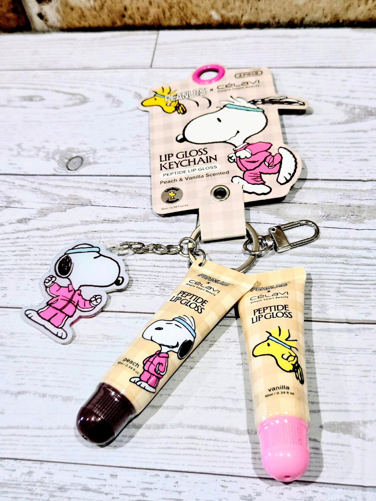 "Podium Pout" Snoopy Olympian Peptide Lip Gloss Keychain Duo Peach & Vanilla