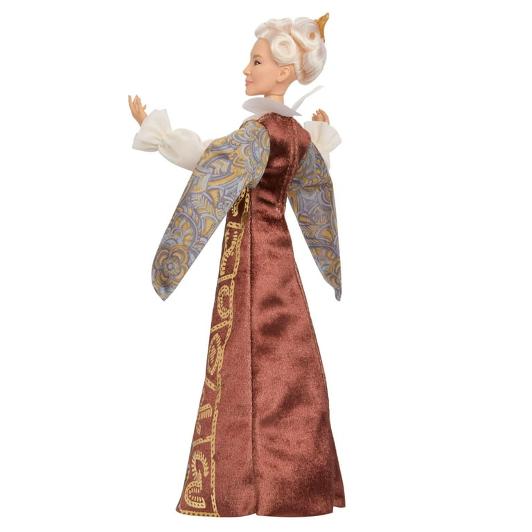 Fashion doll wearing a long maroon satin coat with gold trim and blue patterned sleeves.