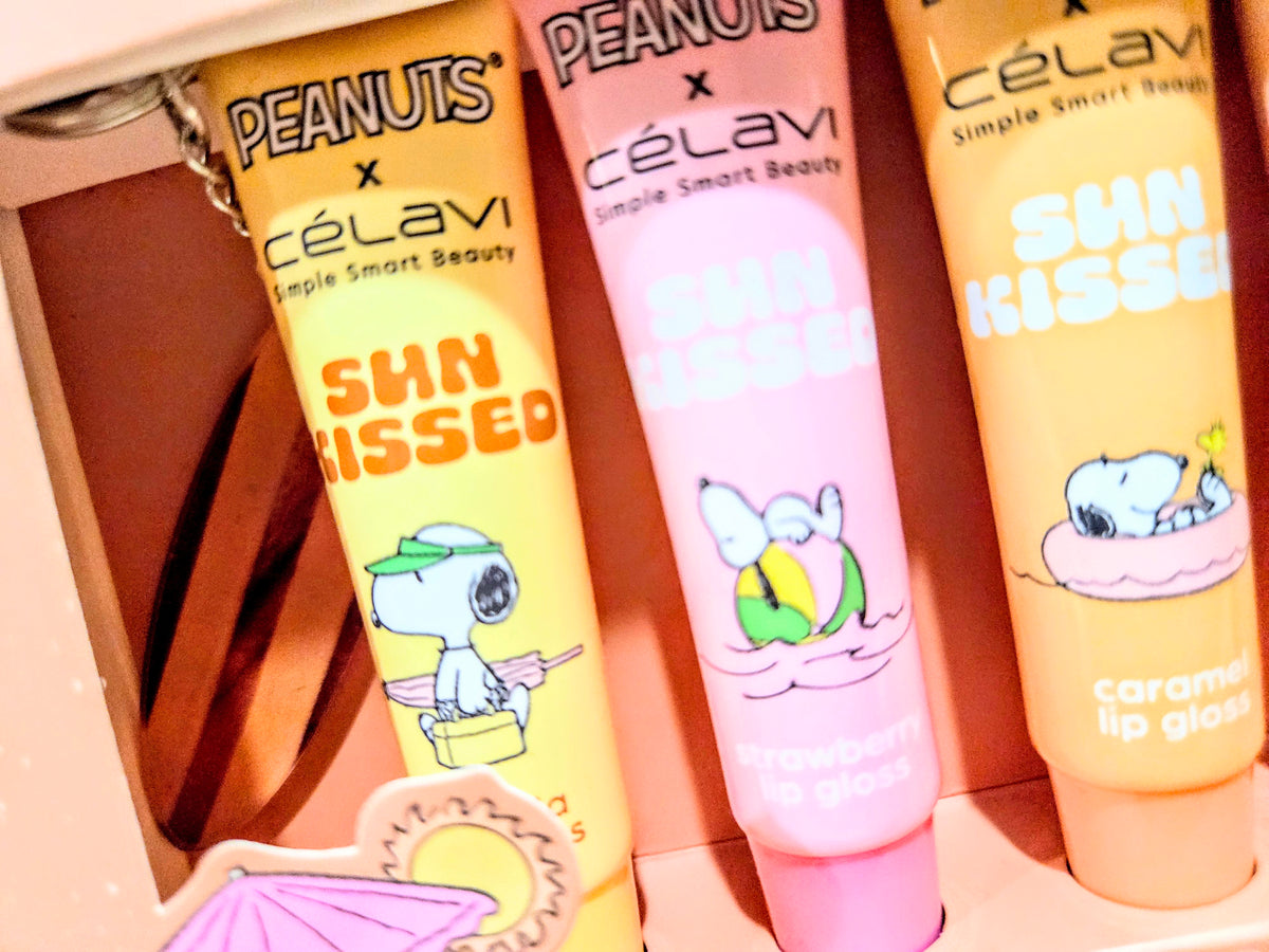 Peanuts Sun Kissed lip gloss tubes in vanilla, strawberry, and caramel shades