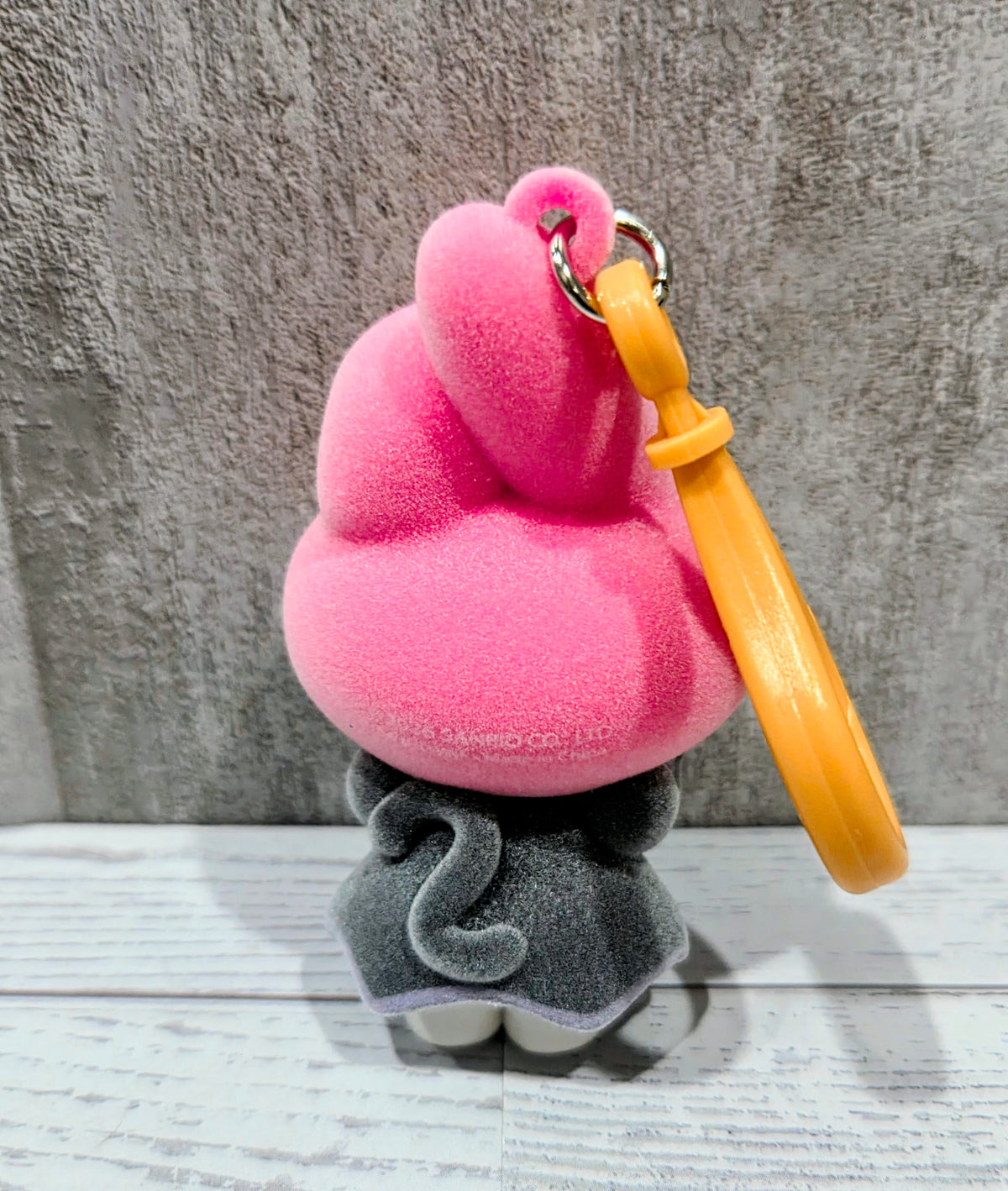 Pink My Melody witch-hat flocked plush bag clip with orange loop and dark outfit