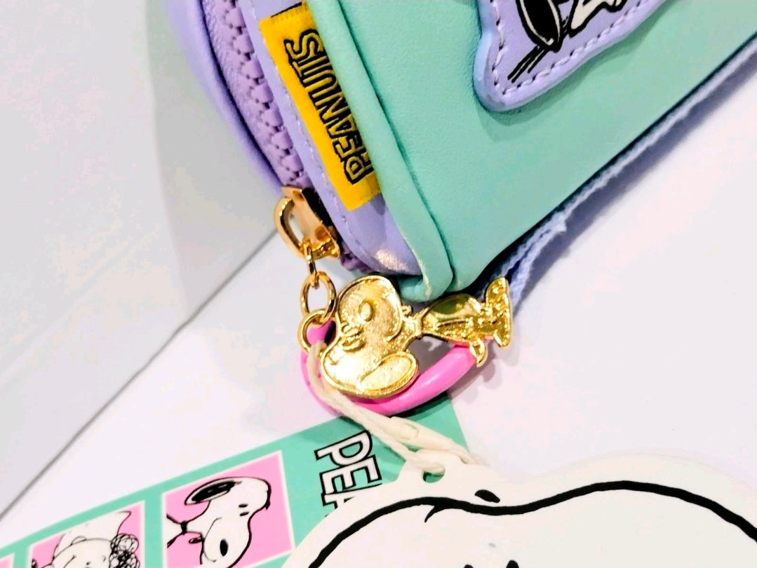 Mint mini zip coin purse corner with gold Snoopy charm and purple trim