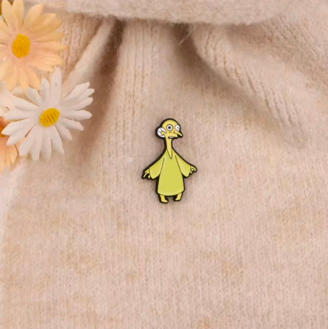 Enamel pin of Simpsons cat lady in lime green dress with white face, small standing