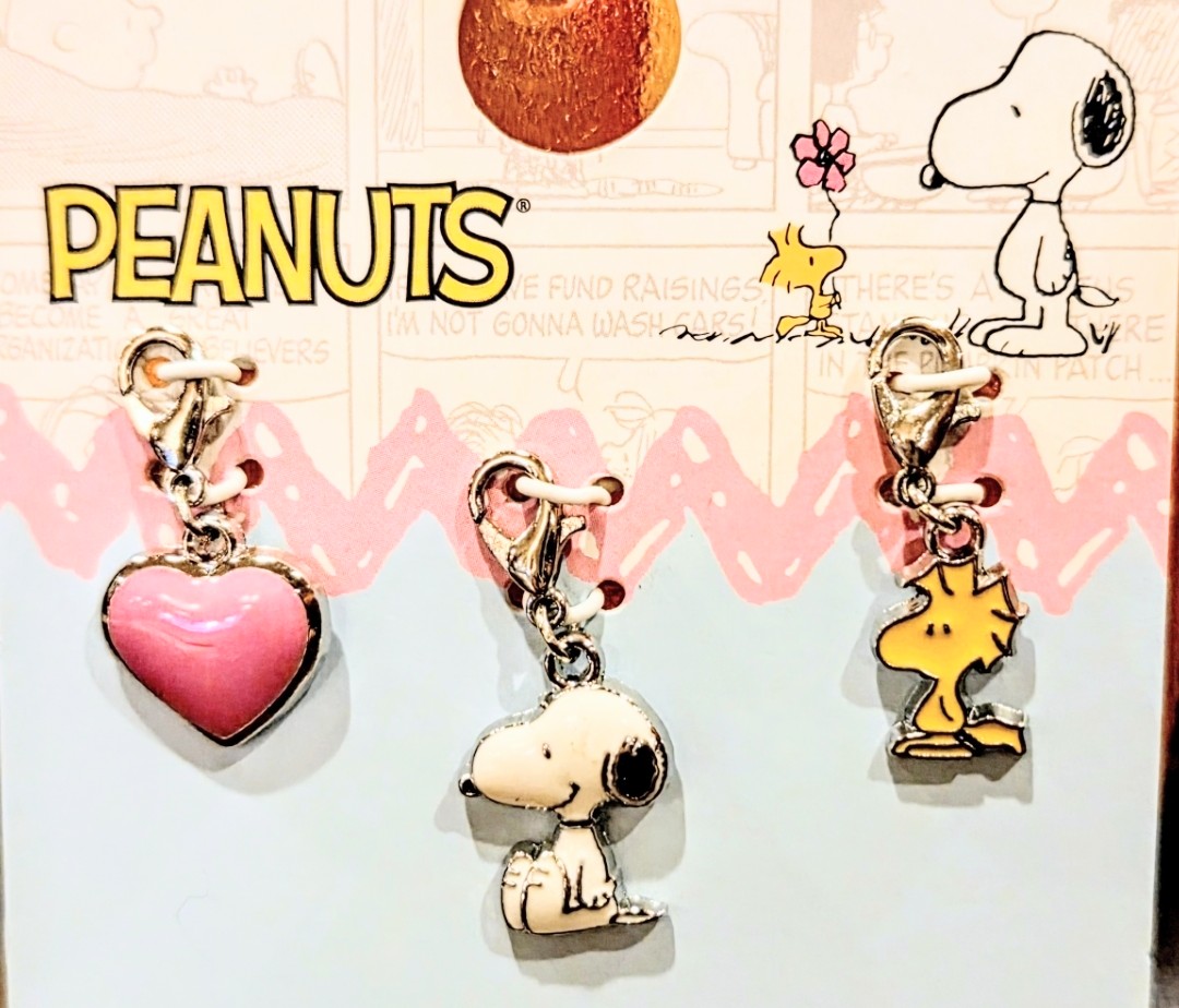 Peanuts charm set with pink heart, Snoopy charm, and yellow bird charm