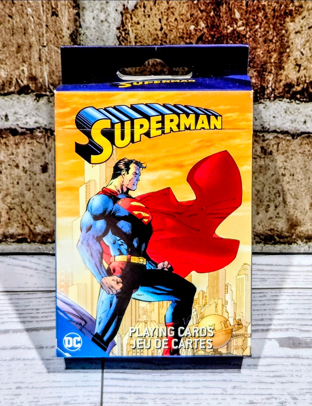 Superman DC Comics playing card deck front, Superman logo and red cape emblem