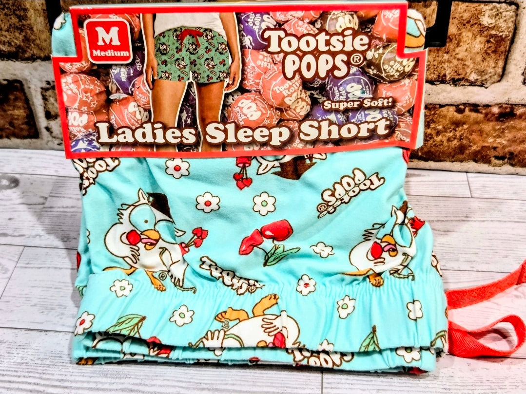 Mint pajama sleep shorts with cartoon character print and elastic waistband detail