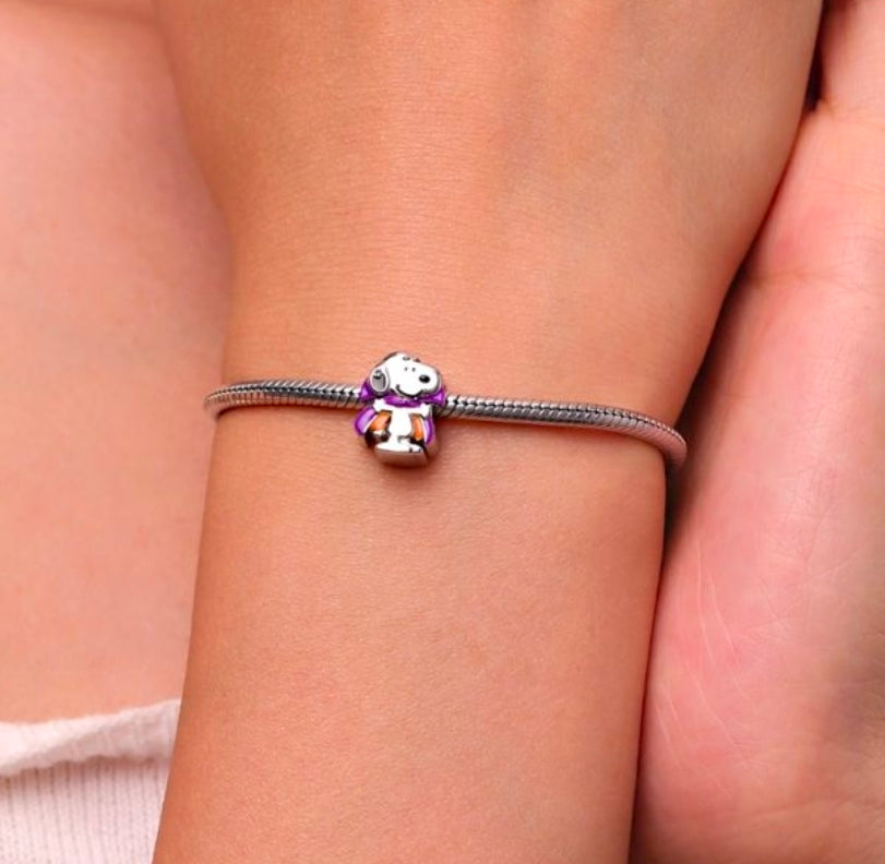 Snoopy vampire charm bead on silver snake bracelet, purple cape and orange