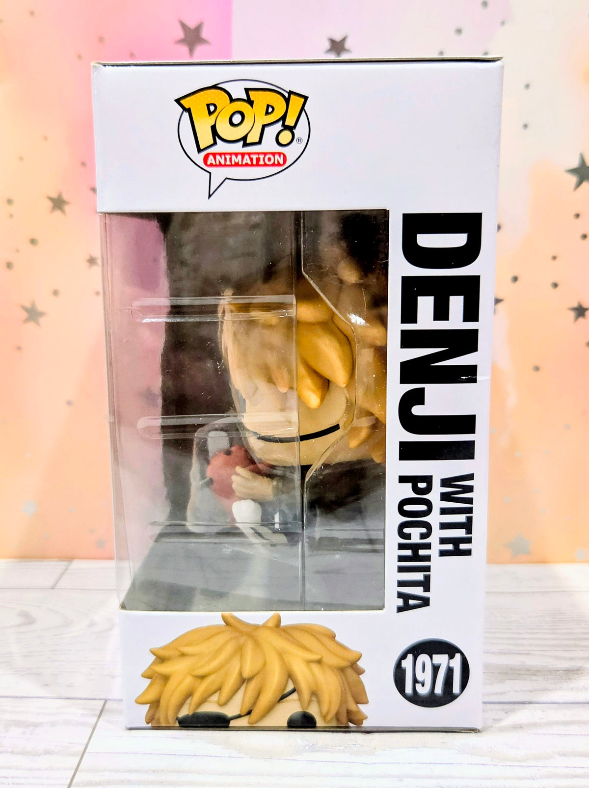 Funko Pop! Animation vinyl figure box showing character profile with red accessory in front window