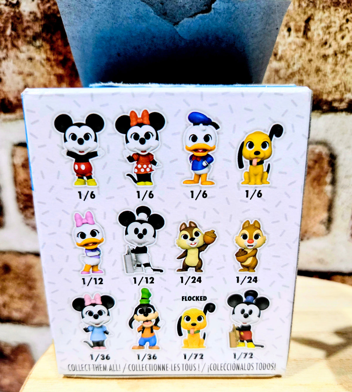 Mickey and Friends mystery minis display card showing character mini icons