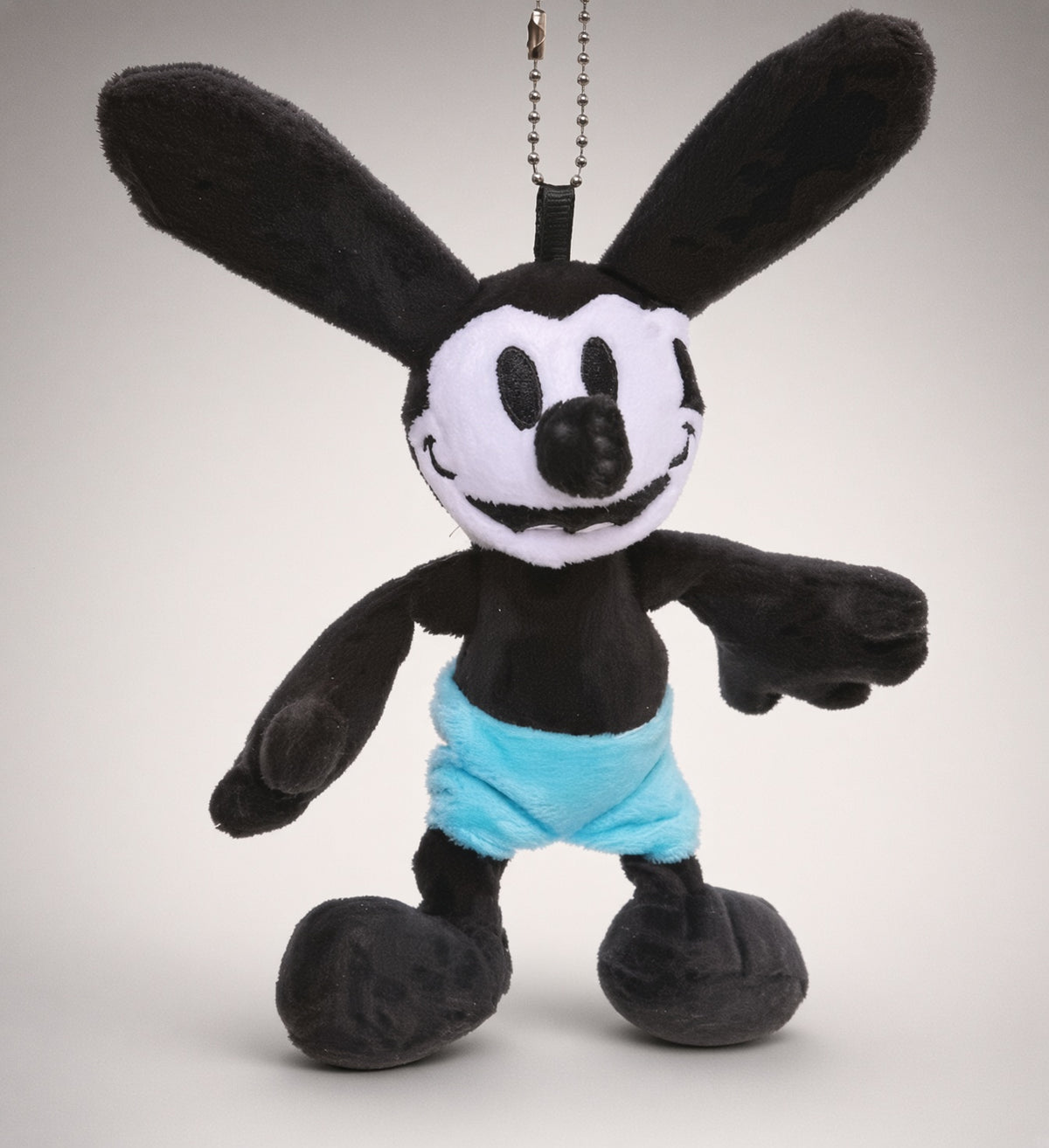 Oswald Lucky Rabbit mini plush keychain rabbit with dangling beaded chain and blue shorts