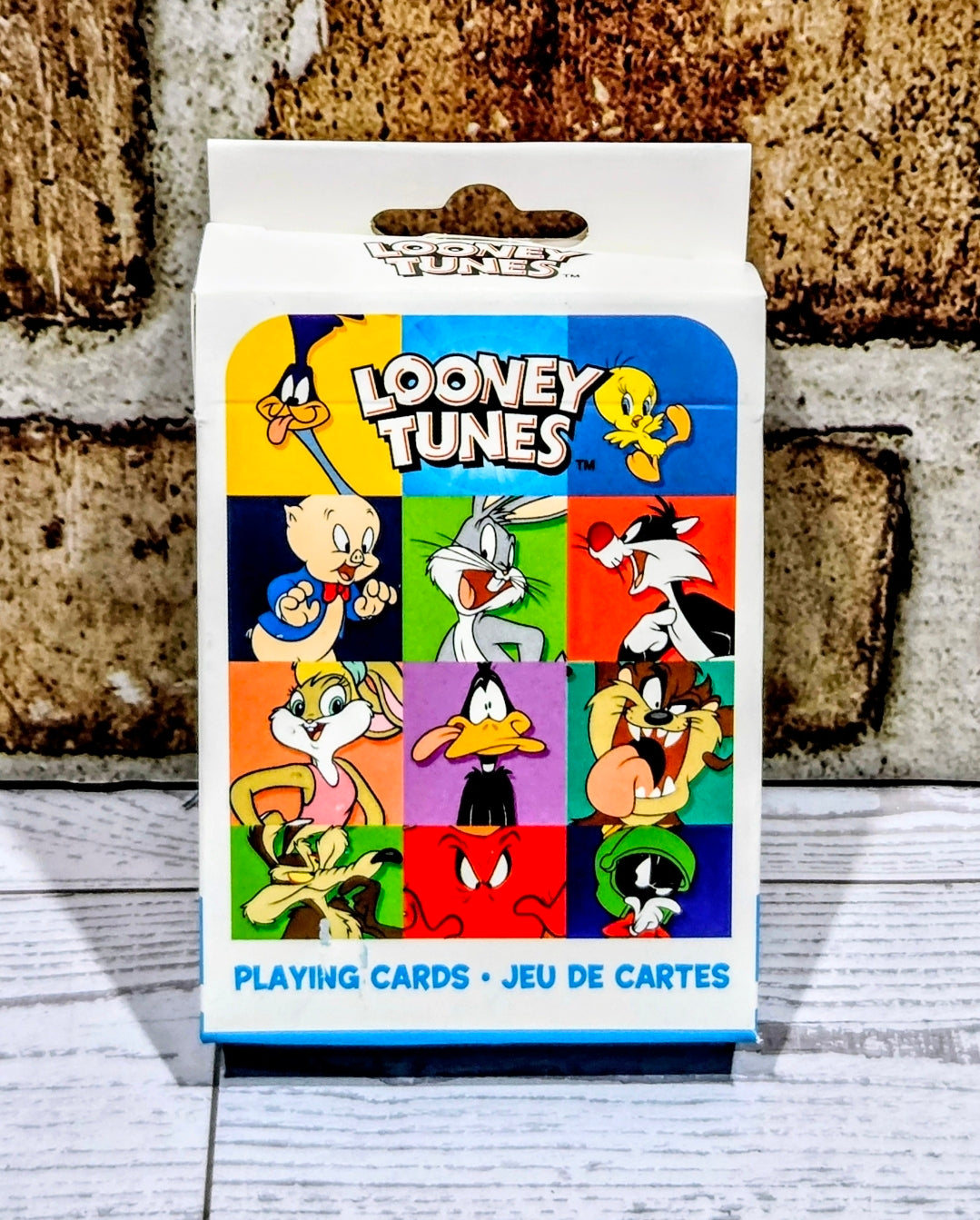 Looney Tunes playing cards box with colorful character grid artwork