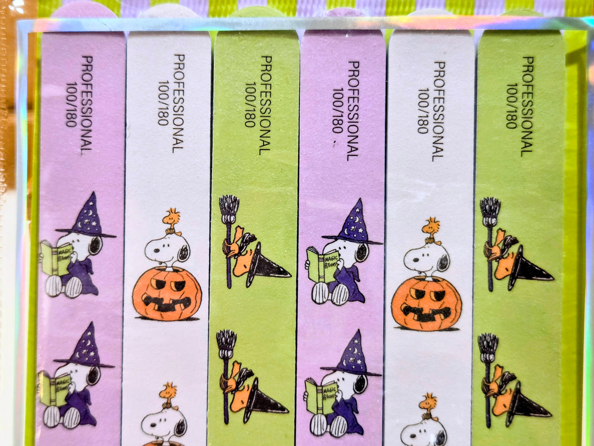Six nail files in molded tray with Peanuts Halloween character graphics