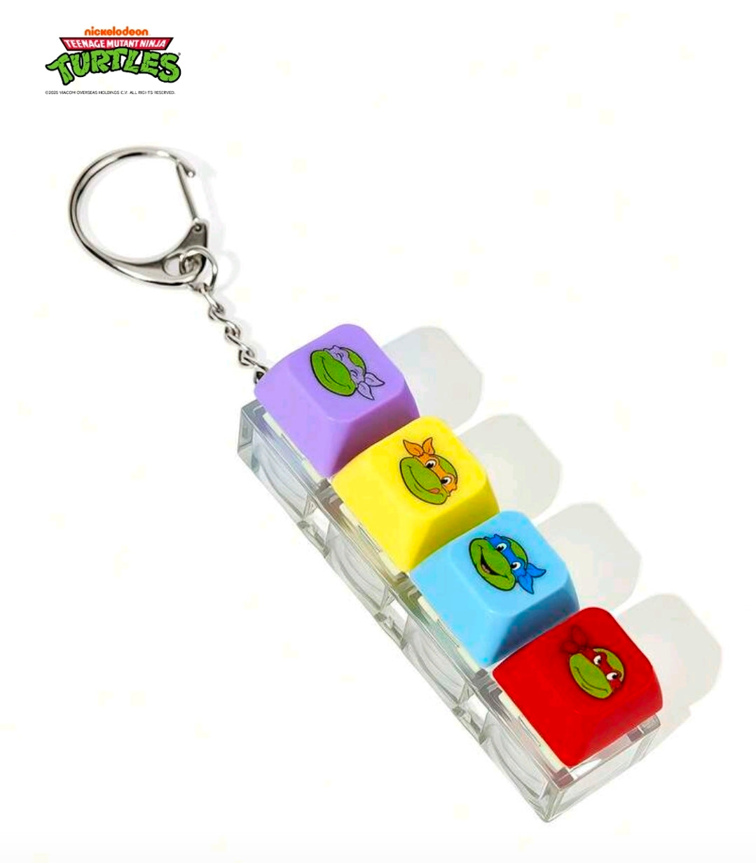 TMNT keyboard clicker keychain with purple, yellow, blue, and red turtle keycaps
