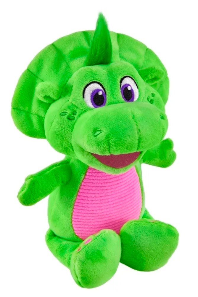 Green plush dinosaur doll with purple eyes and pink striped shirt, friendly smile